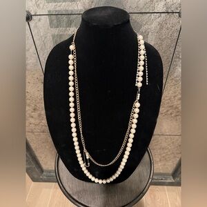 Betsey Johnson Gold and Cream Pearl Necklace With Rhinestone Safety Pin Detail.